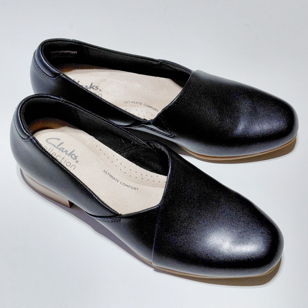Clarks Black Leather Slip-On Flats. Juliet Palm black classic loafers